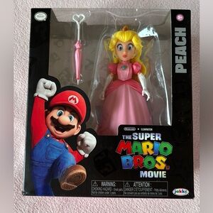 Nintendo Princess Peach Figure in Pink Gown with Yellow Hair